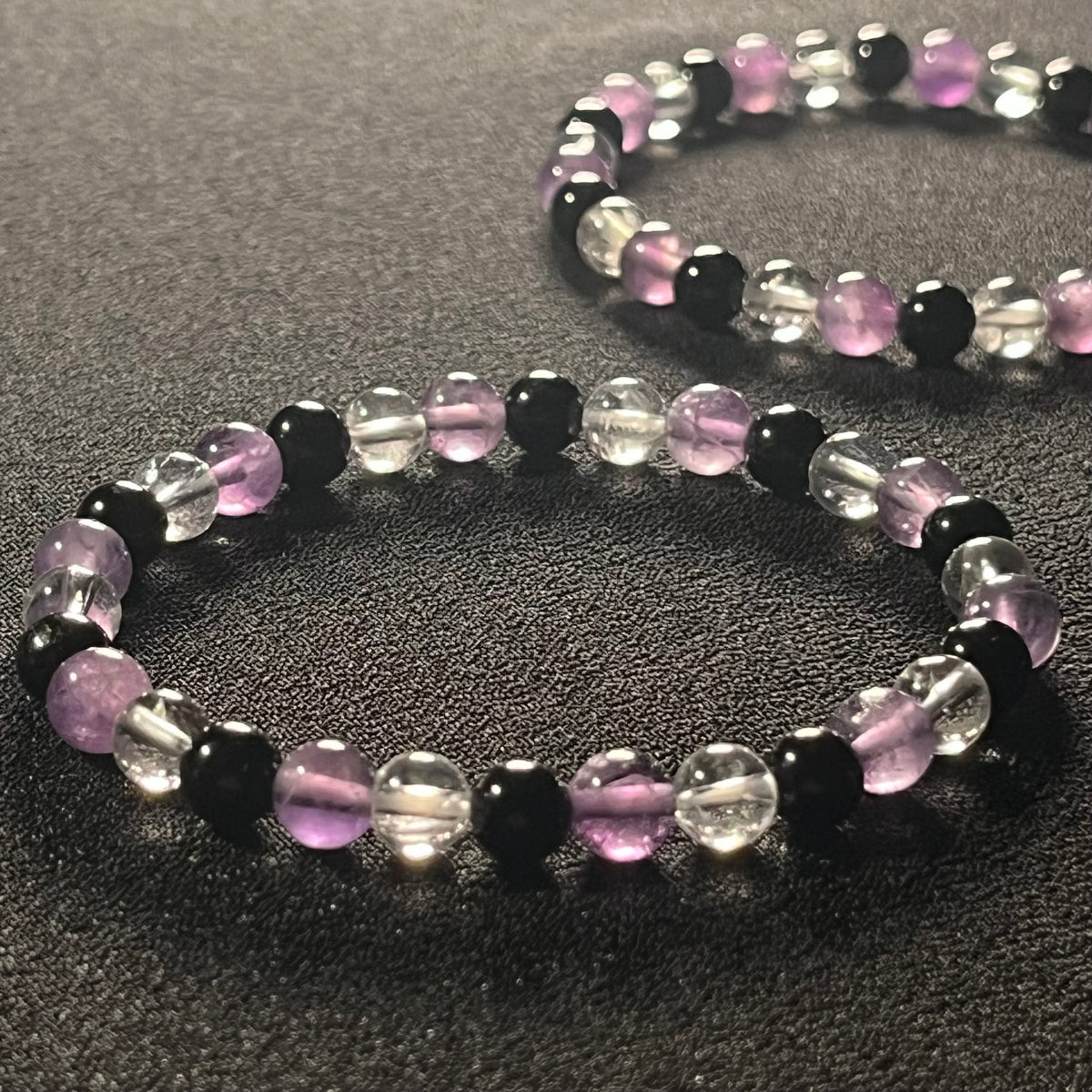 Amethyst, Black Tourmaline, & Rock Crystal Quartz smooth round 6mm bead stretch bracelet