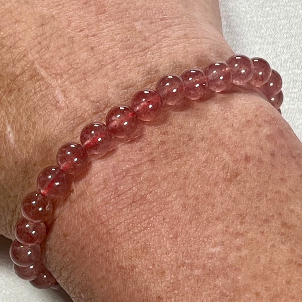 Strawberry Quartz smooth round 6mm bead stretch bracelet (AA grade)