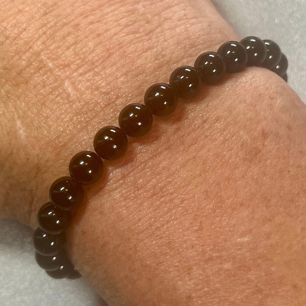 Black Tourmaline (Schorl) smooth round 6mm bead stretch bracelet (premium); October birthstone