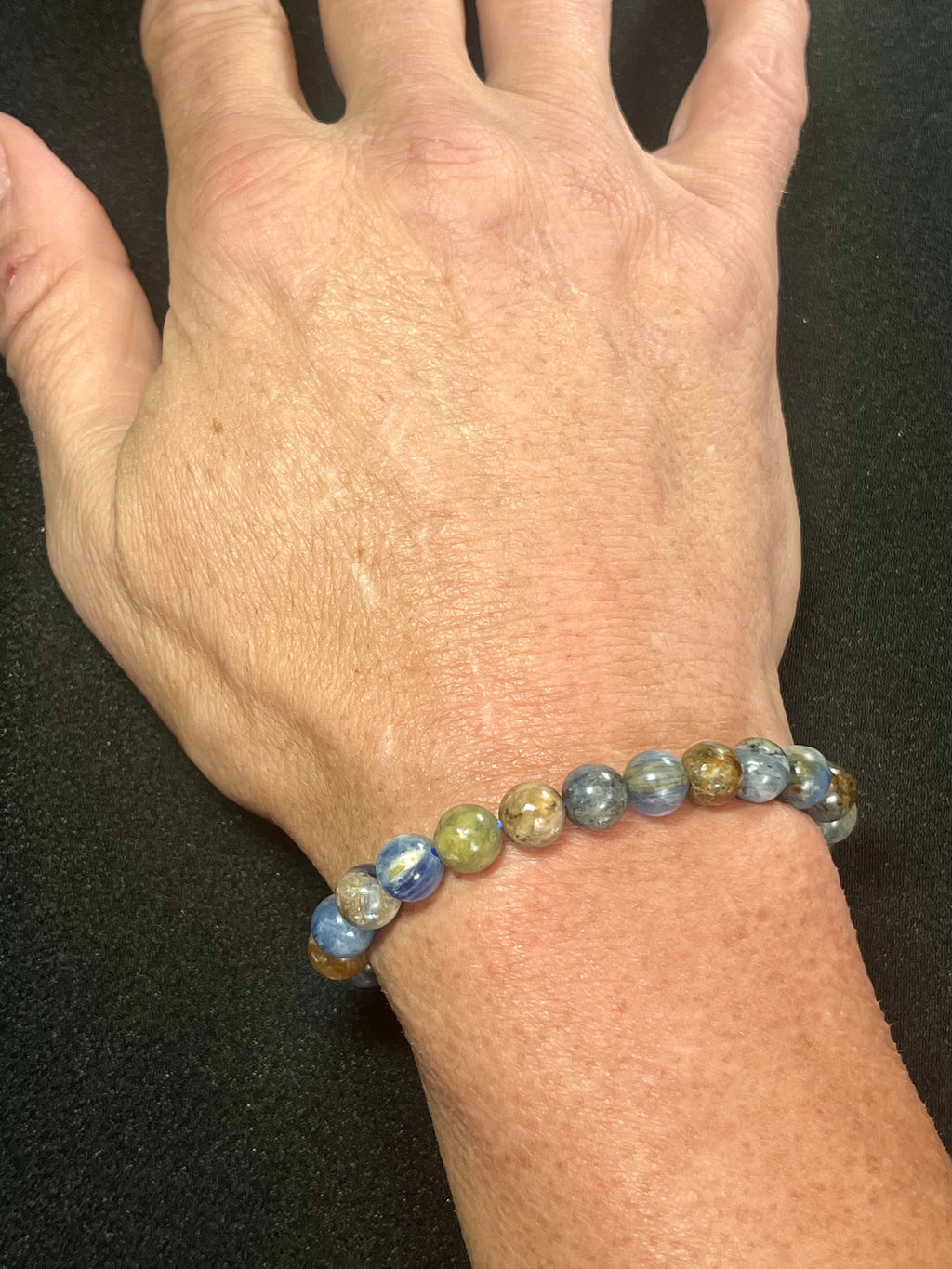 Sunset Kyanite smooth round 8mm bead stretch bracelet