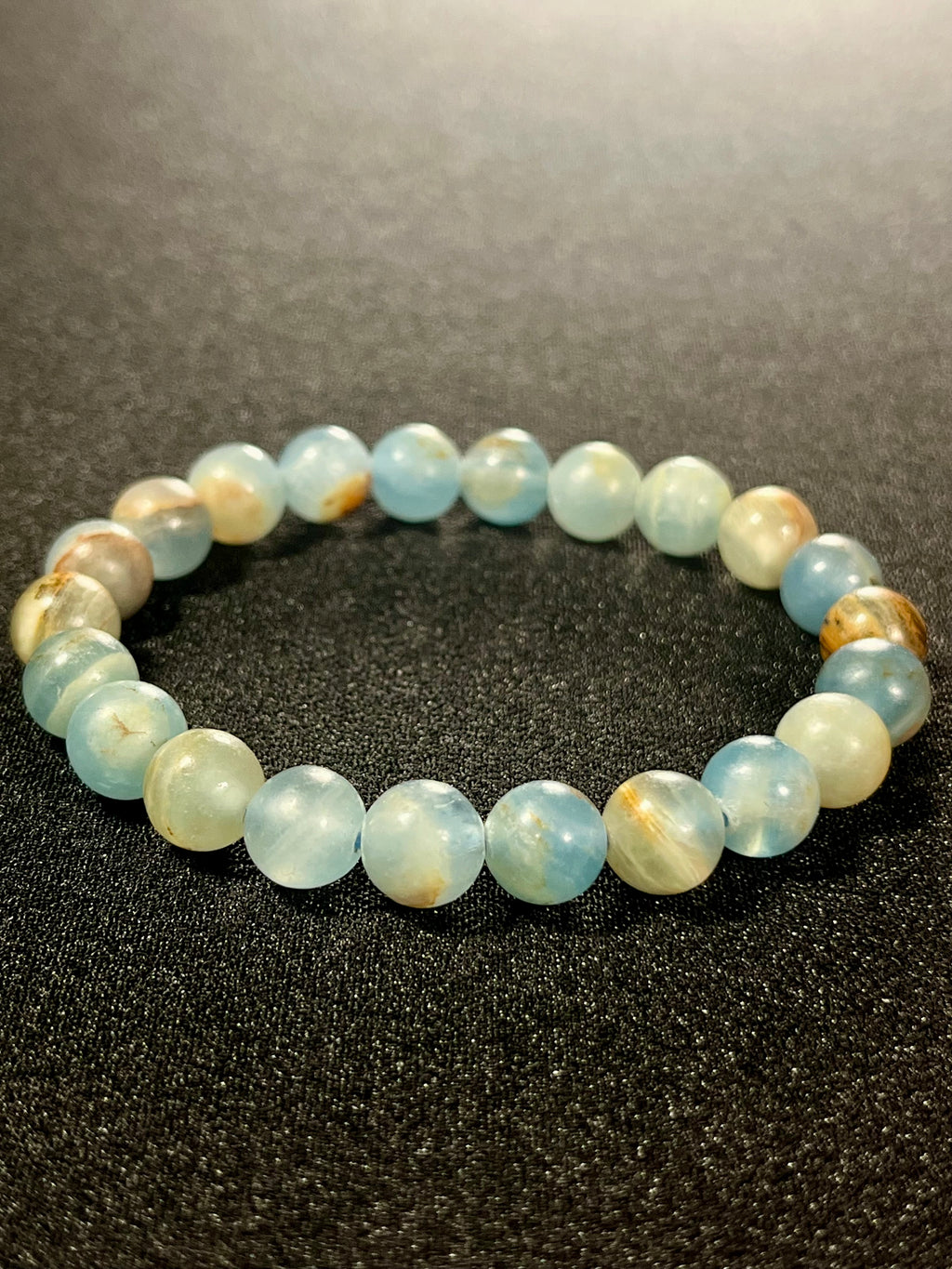 Argentina Blue Calcite smooth round 8mm bead stretch bracelet (AAA grade)