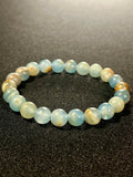 Argentina Blue Calcite smooth round 8mm bead stretch bracelet (AAA grade)