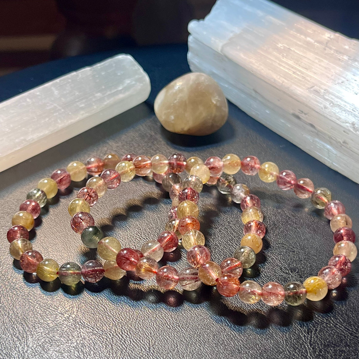 Strawberry, Golden, & Green Rutilated Quartz smooth round 7mm bead stretch bracelet