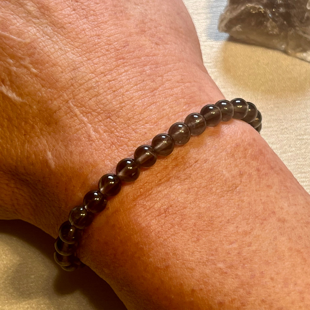Smoky Quartz smooth round 6mm bead stretch bracelet (AA grade)