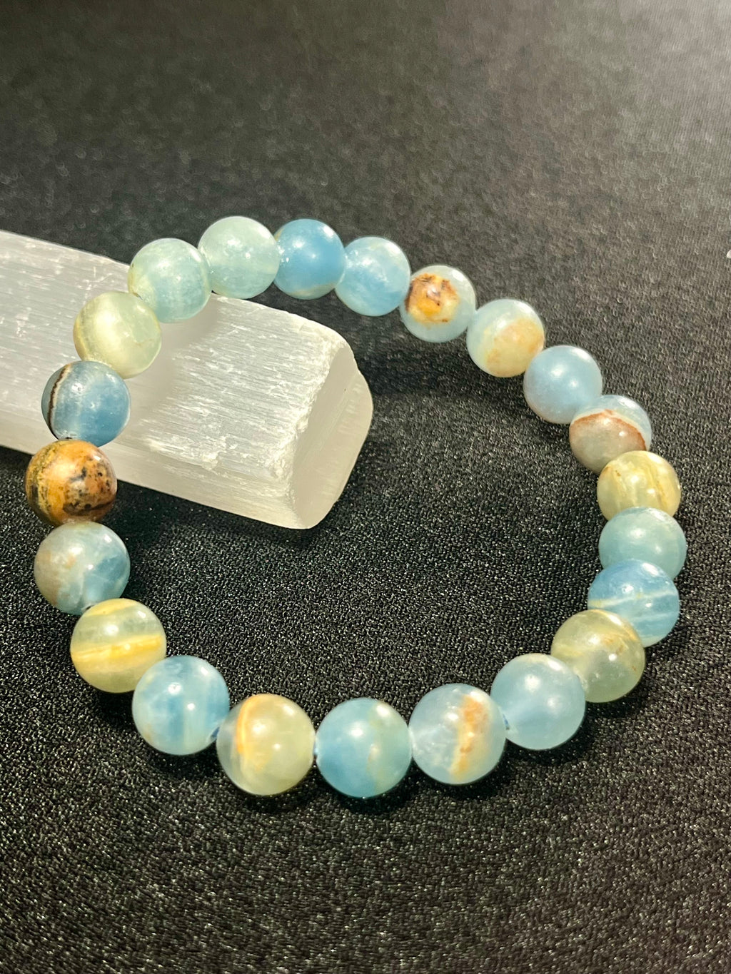 Argentina Blue Calcite smooth round 8mm bead stretch bracelet (AAA grade)