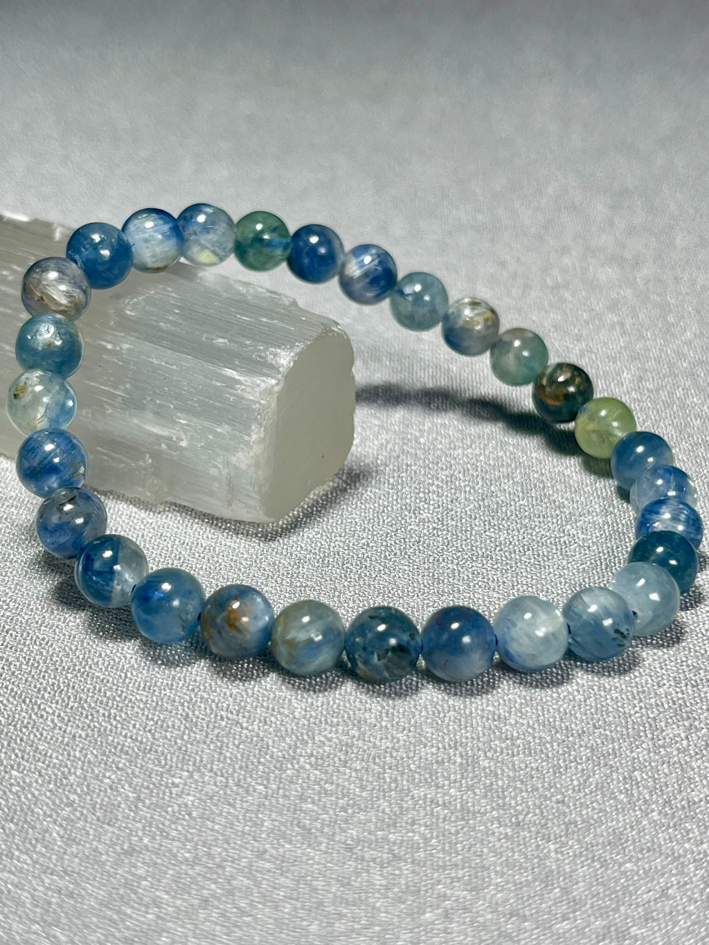 Blue Kyanite Mix smooth round 6mm bead stretch bracelet