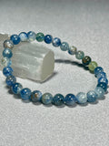Blue Kyanite Mix smooth round 6mm bead stretch bracelet