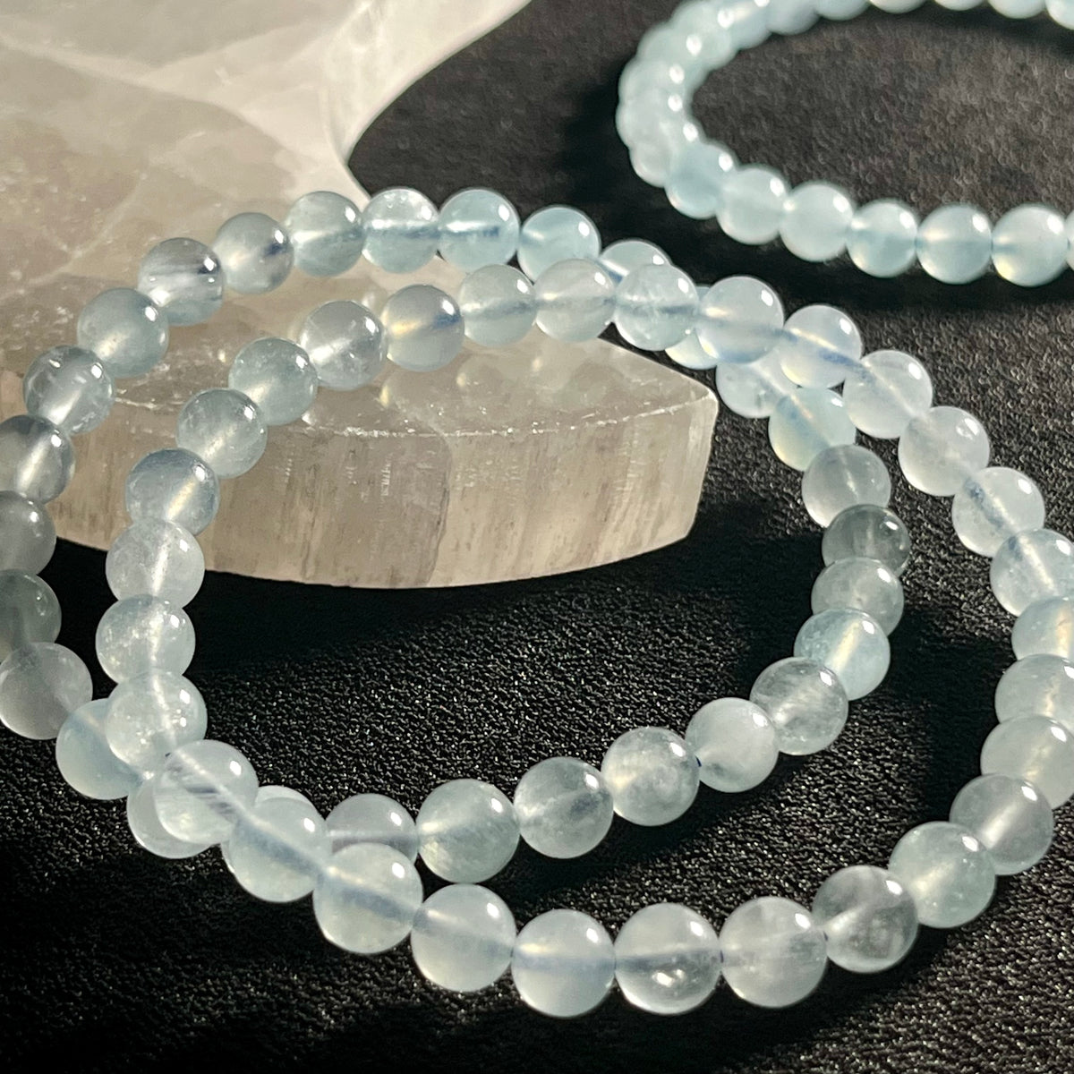 Aquamarine smooth round 6mm bead stretch bracelet; March birthstone