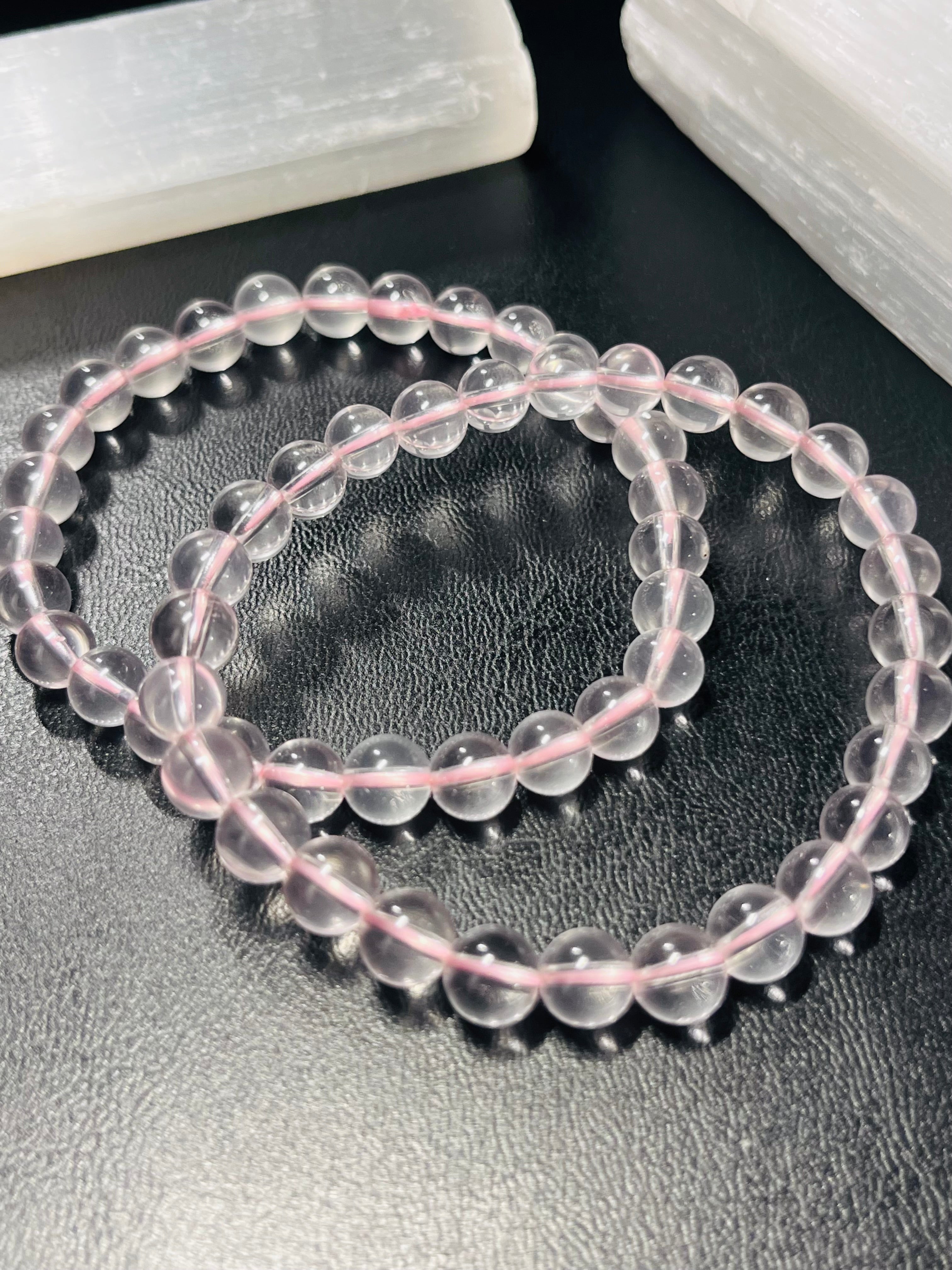 Light Pink Mozambique Rose Quartz smooth round 6.5mm bead stretch bracelet (AAA grade); October birthstone