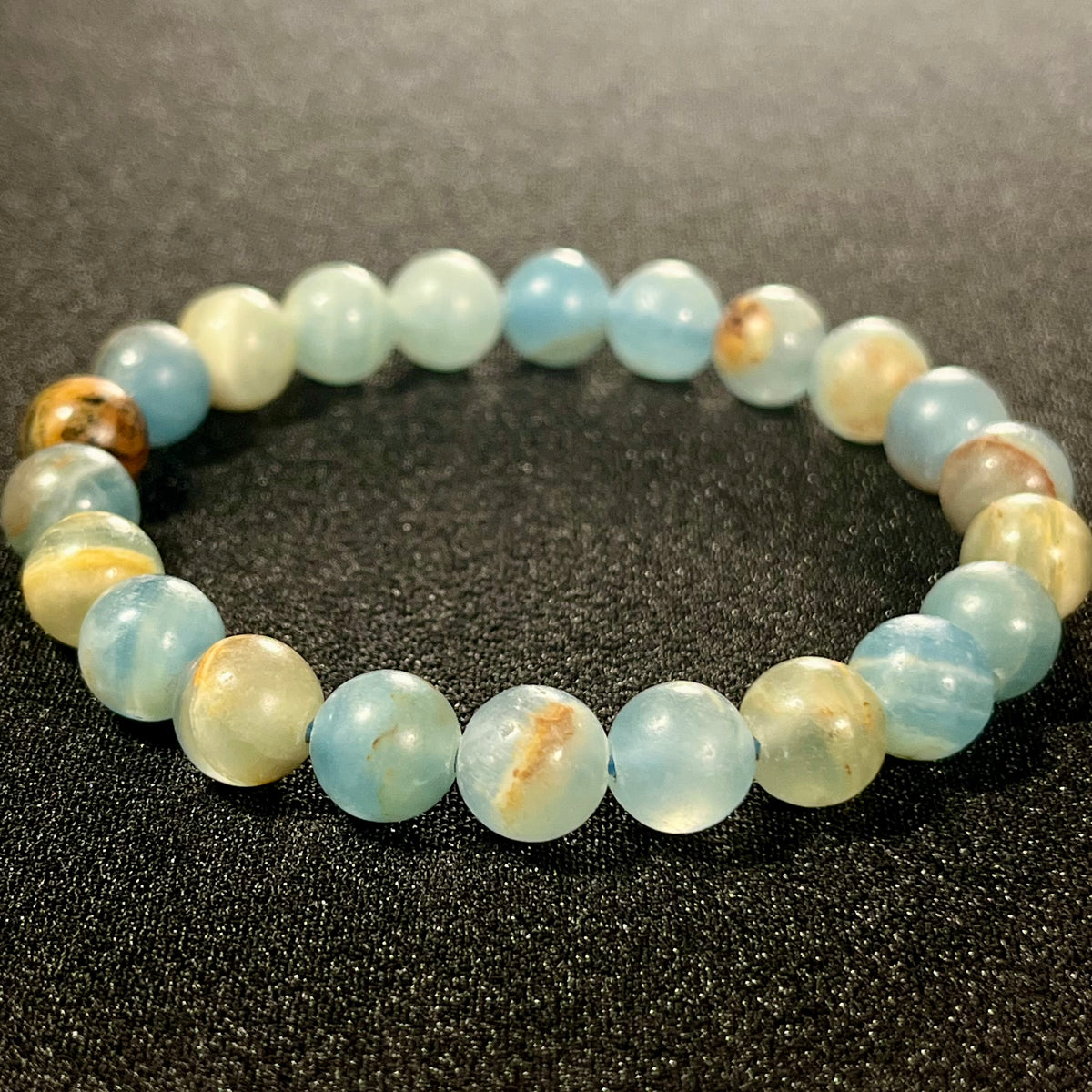 Argentina Blue Calcite smooth round 8mm bead stretch bracelet (AAA grade)