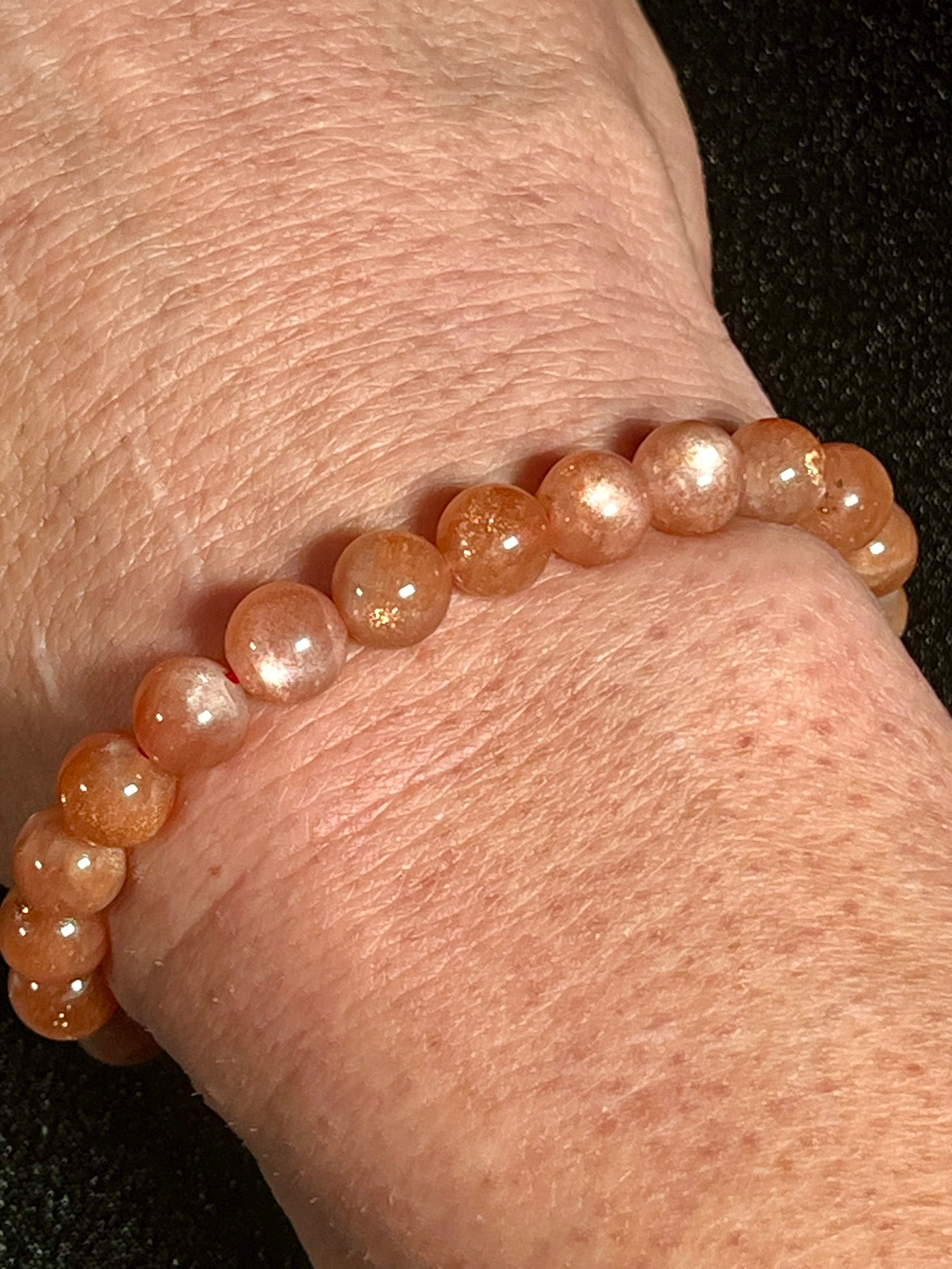 Sunstone w/ Moonstone adularescence flash smooth round 8mm bead stretch bracelet (AAA grade)