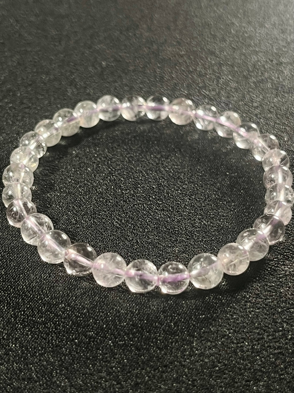 Light Lavender Amethyst smooth round 6mm bead stretch bracelet (AAA grade); February birthstone