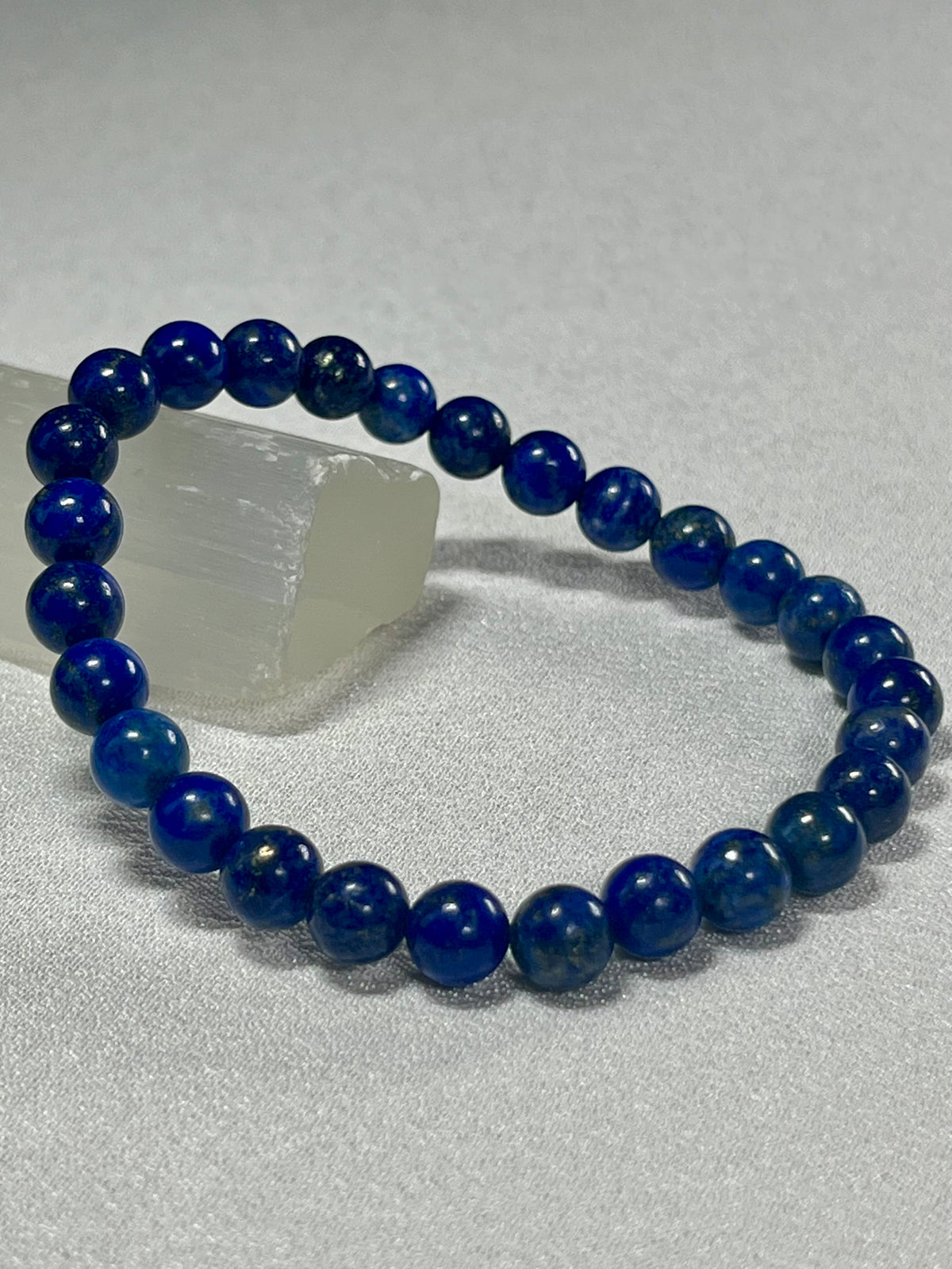 Lapis Lazuli smooth round 6mm bead stretch bracelet (A grade); alternative September birthstone