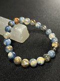Sunset Kyanite smooth round 8mm bead stretch bracelet