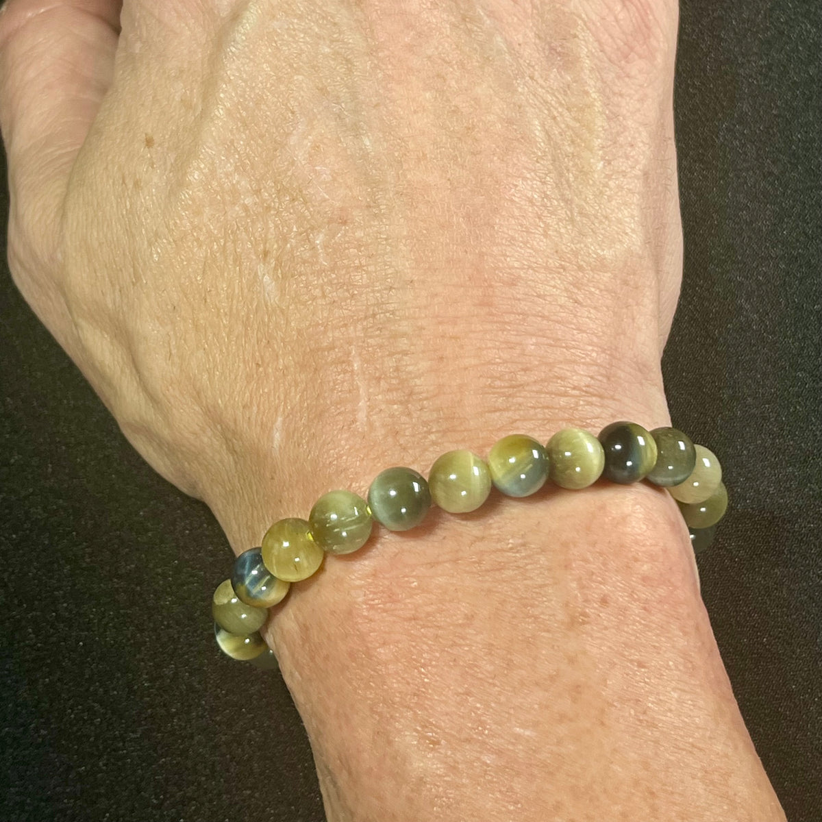 Blue & Golden Tiger’s Eye smooth round 4mm, 6mm, and 8mm bead stretch bracelet