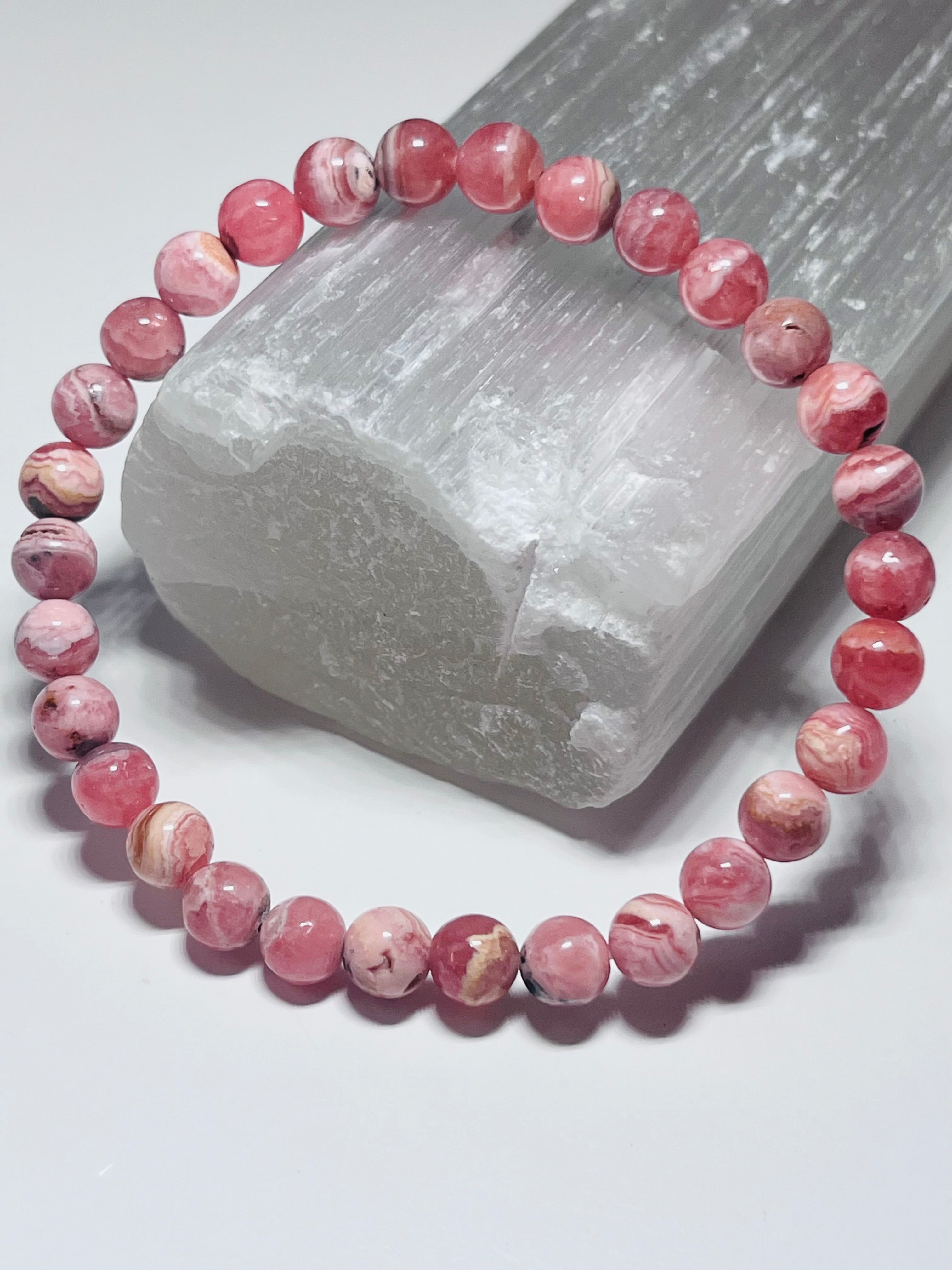 Argentina Rhodochrosite smooth round 6mm bead stretch bracelet