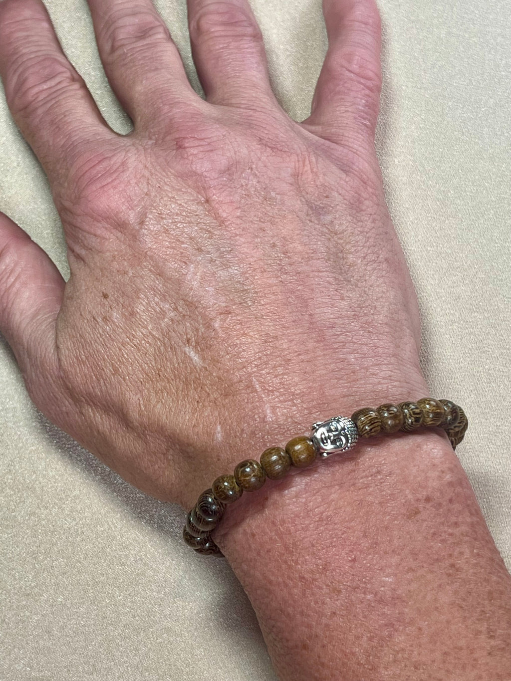 Philippines Robles Wood round 6mm bead stretch bracelet w/ silver Buddha focal