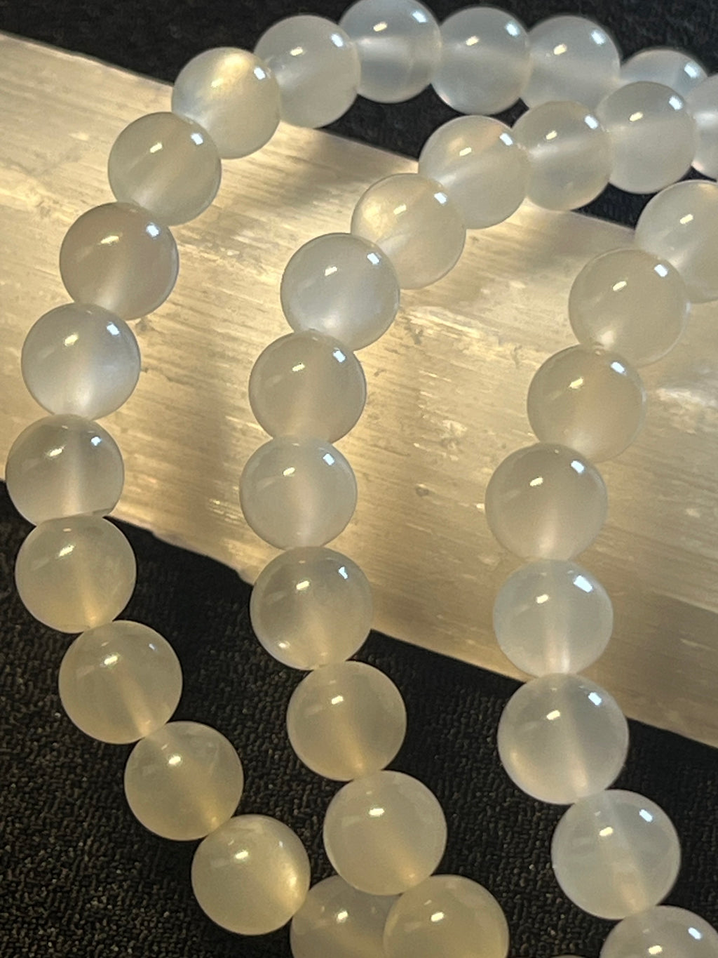 White Moonstone silver flash smooth round 6mm bead stretch bracelet (AA grade); alternative June birthstone
