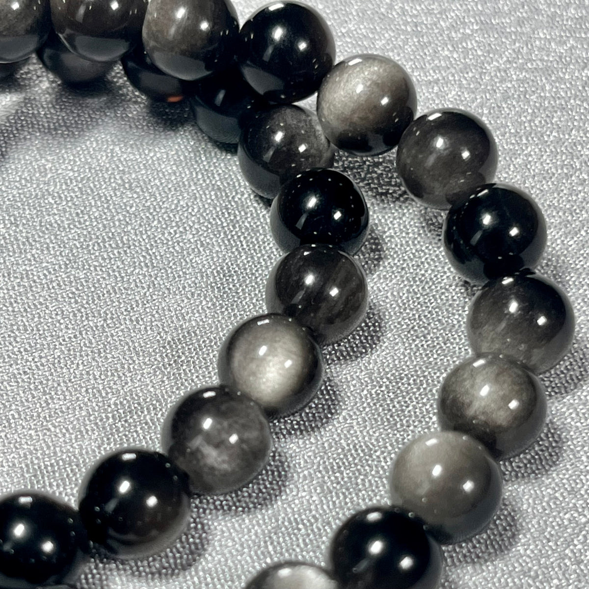 Silver Sheen Obsidian smooth round 8mm bead stretch bracelet