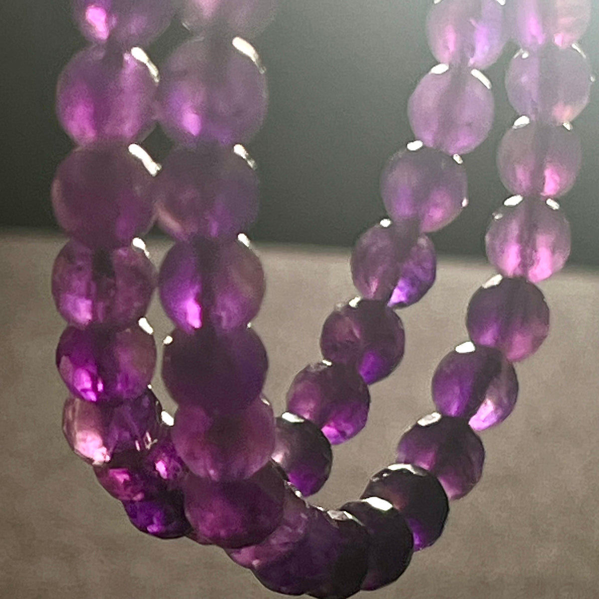 Amethyst (dark) faceted round 6mm bead stretch bracelet w/4mm microfaceted Clear Quartz spacer
