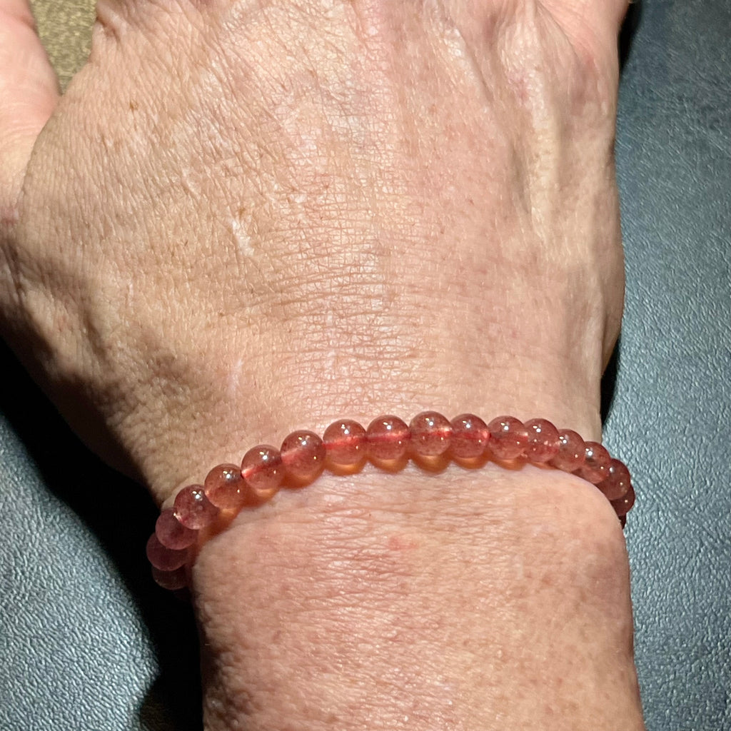 Strawberry Quartz smooth round 6mm bead stretch bracelet (AAA grade)