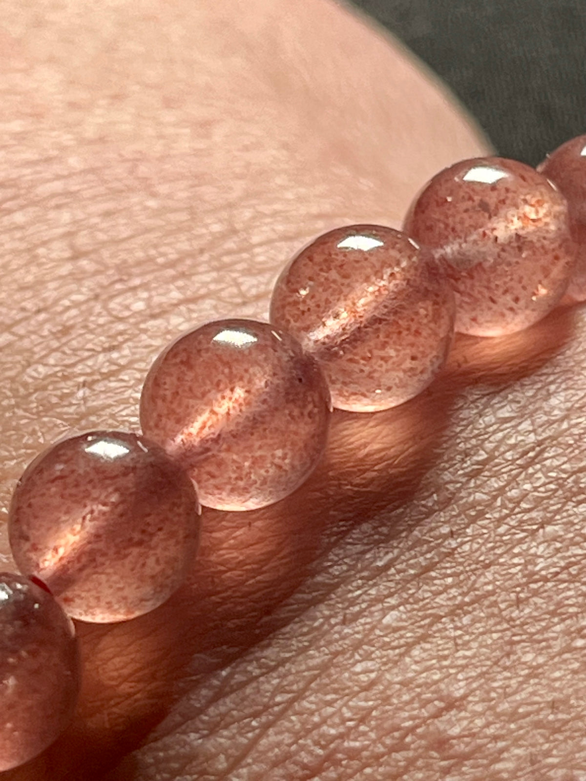 Strawberry Quartz w/ Sparkling Golden Sunstone inclusions smooth round 8mm bead stretch bracelet (AAA grade)