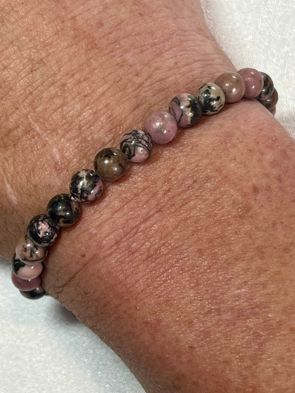 Rhodonite with black matrix smooth round 6mm bead stretch bracelet