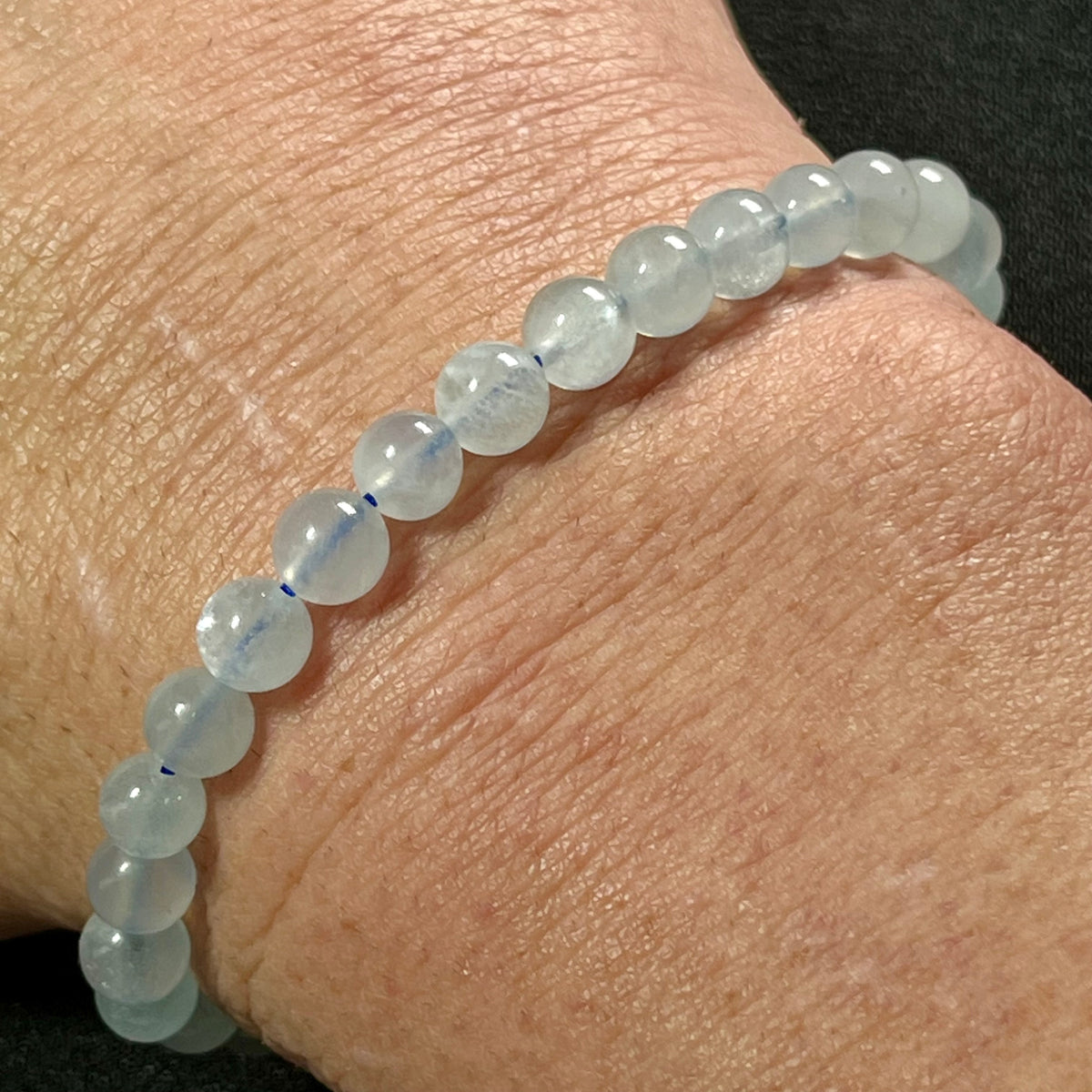 Aquamarine smooth round 6mm bead stretch bracelet; March birthstone