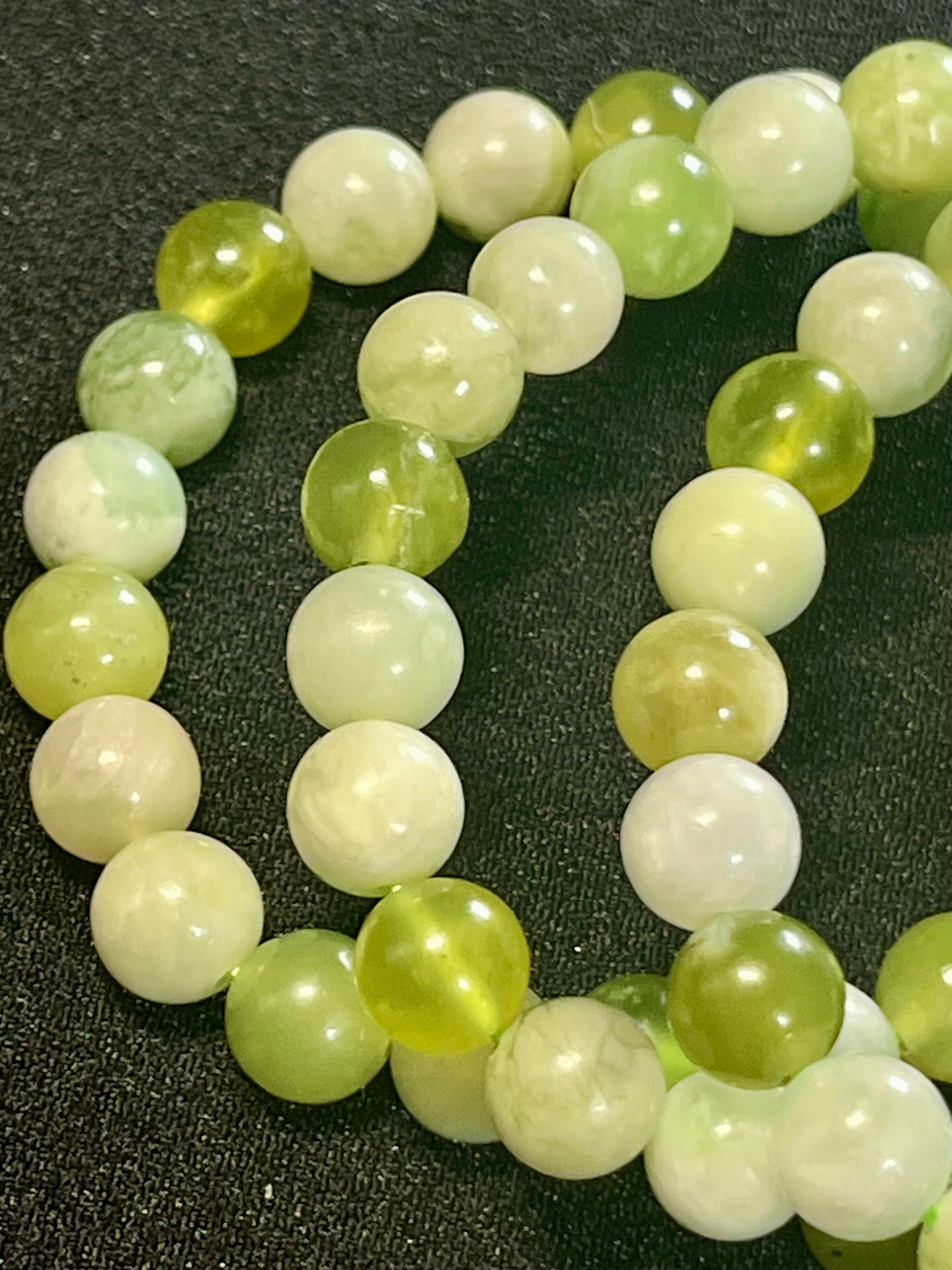 Green & White Jade smooth round 8mm bead stretch bracelet
