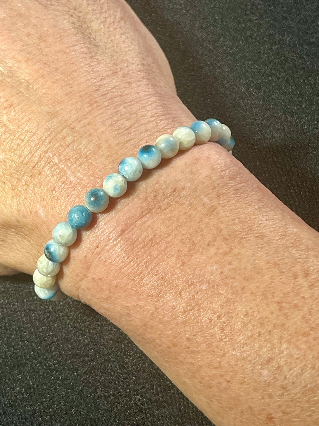 Blue Ice (Glacierite)smooth round 6mm bead stretch bracelet (A grade)