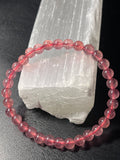 Strawberry Quartz smooth round 6mm bead stretch bracelet (AAA grade)