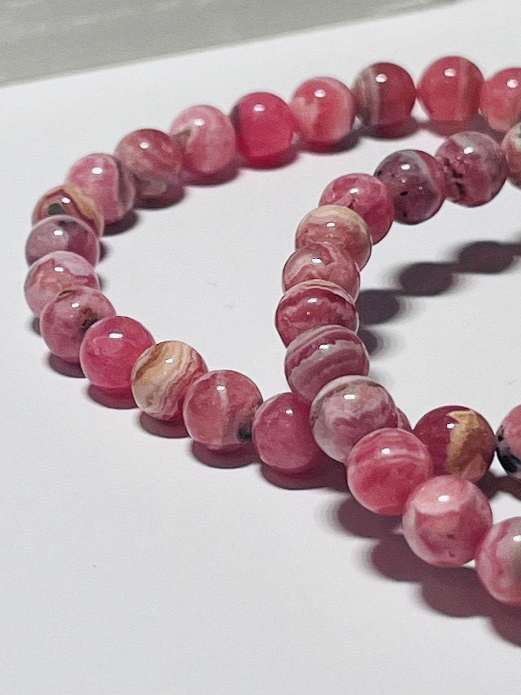Argentina Rhodochrosite smooth round 6mm bead stretch bracelet