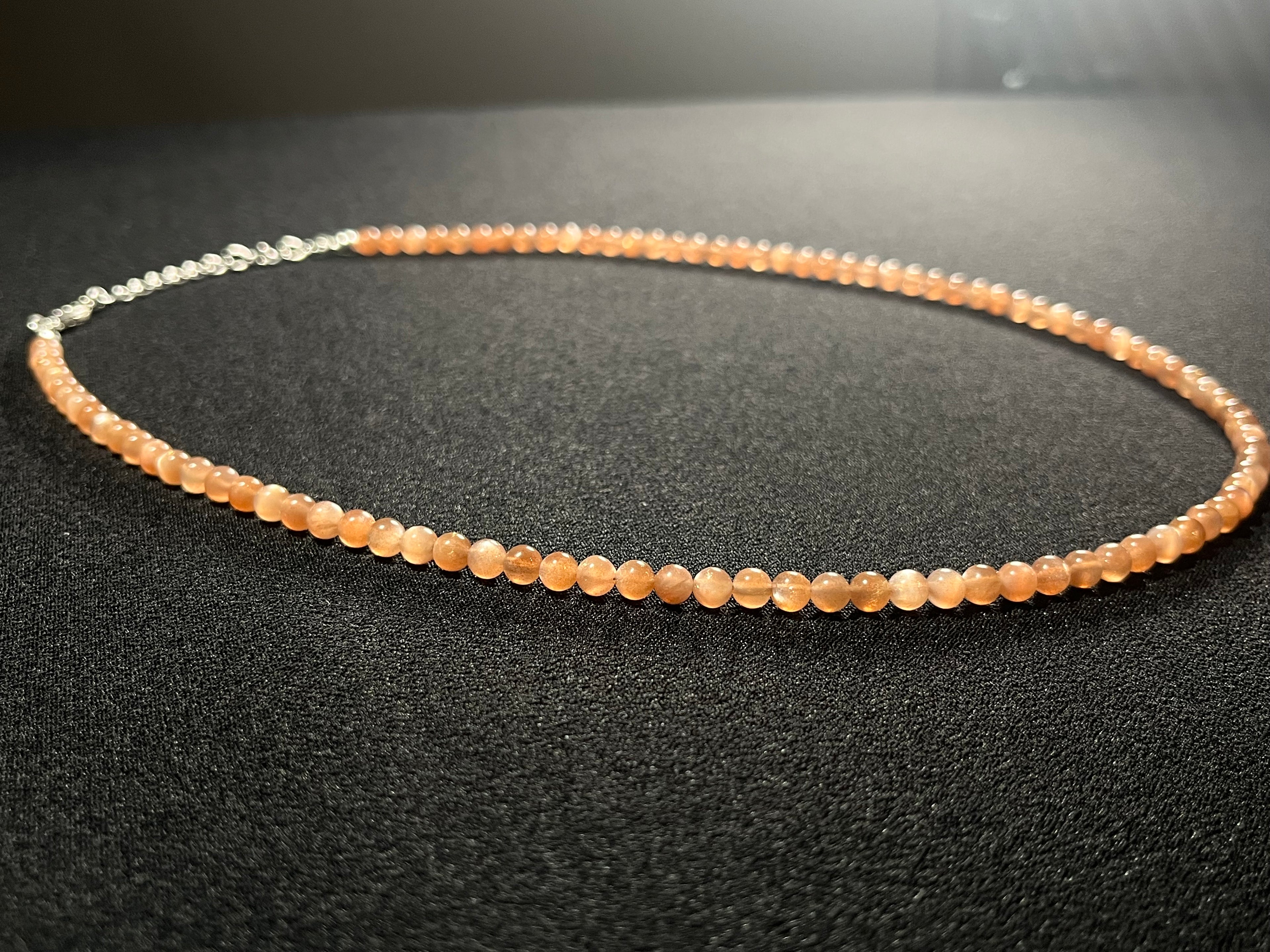 Sunstone w/ strong Moonstone-like adularescence smooth round 4mm bead silver clasp necklace (premium grade)