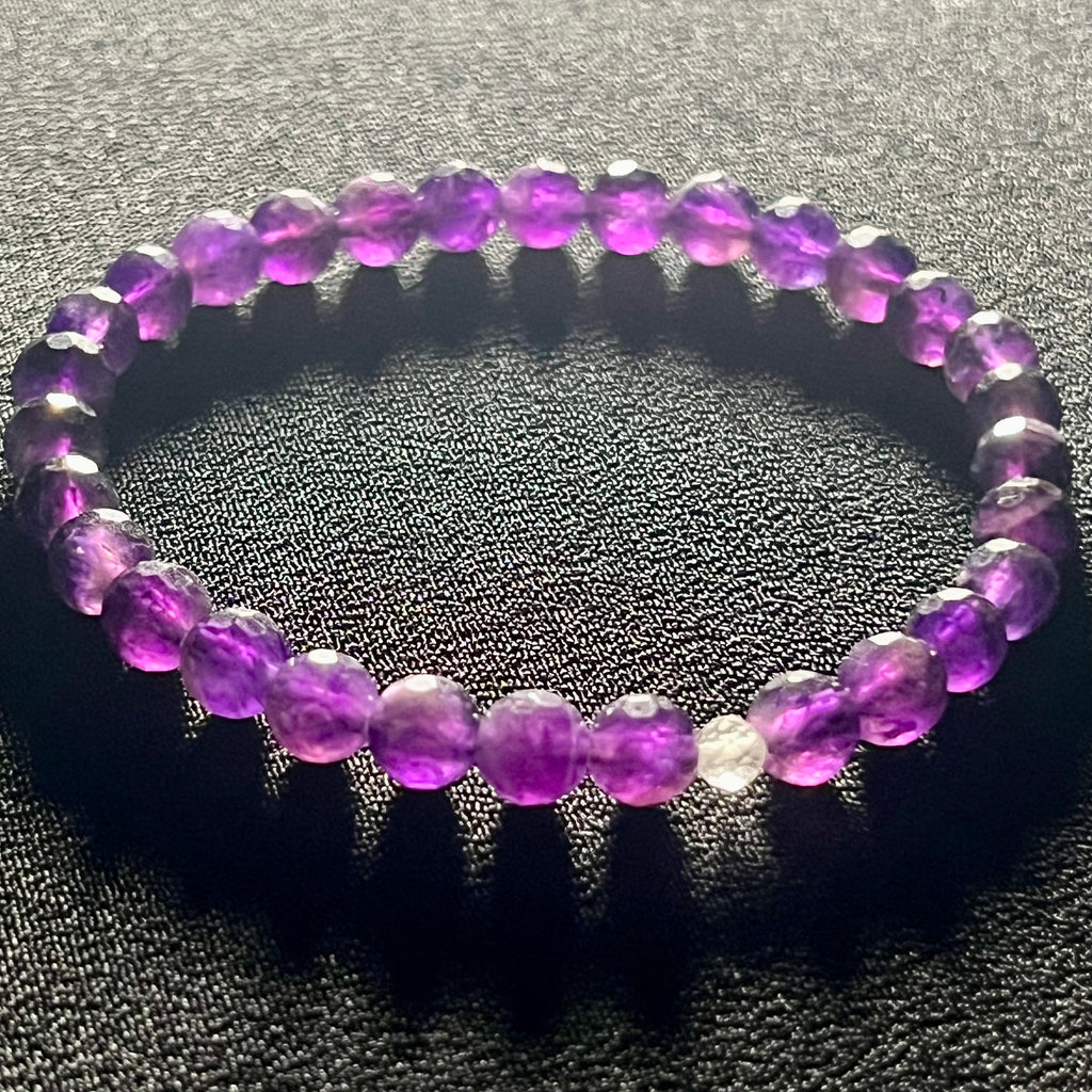 Amethyst (dark) faceted round 6mm bead stretch bracelet w/4mm microfaceted Clear Quartz spacer