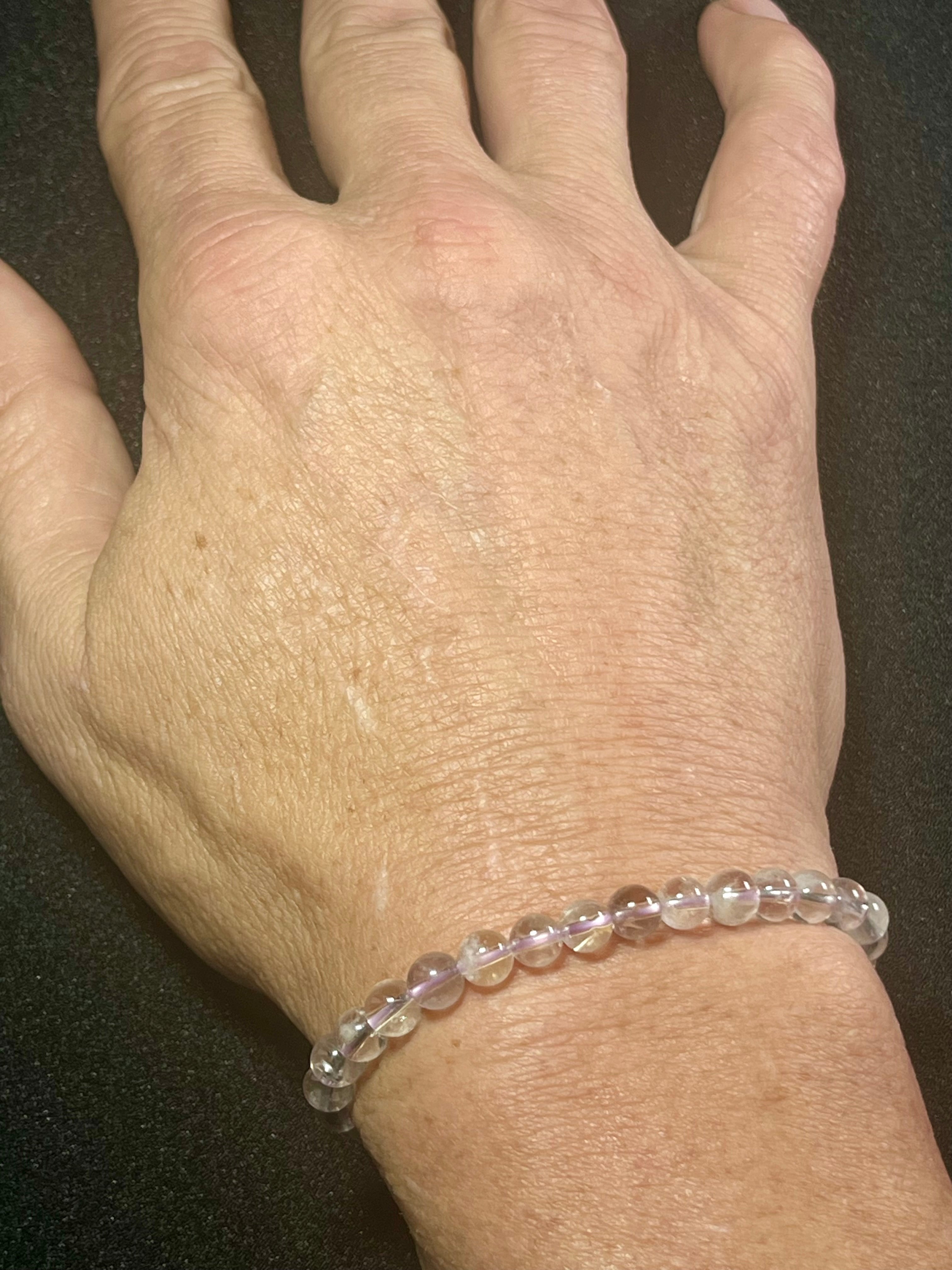 Light Lavender Amethyst smooth round 6mm bead stretch bracelet (AAA grade); February birthstone