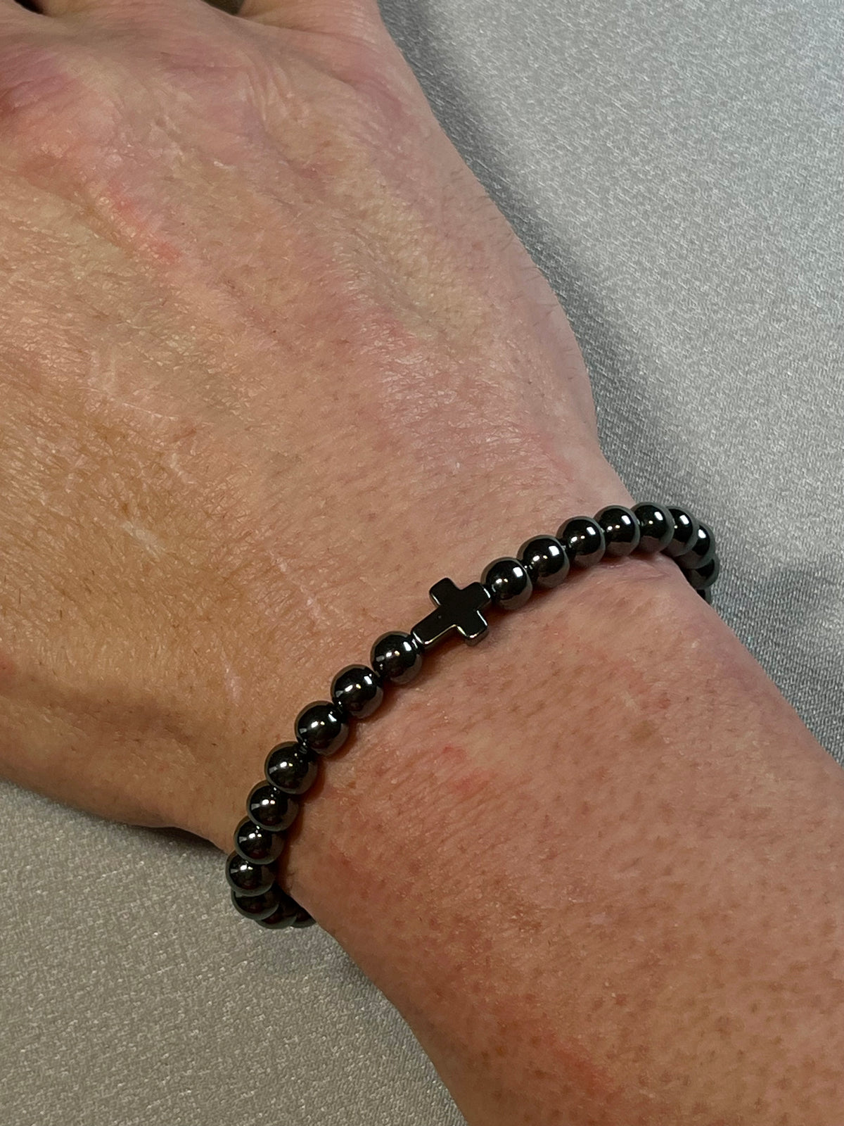 Hematite smooth round 4mm and 6mm bead stretch bracelets w/ Hematite Christian cross focal beads
