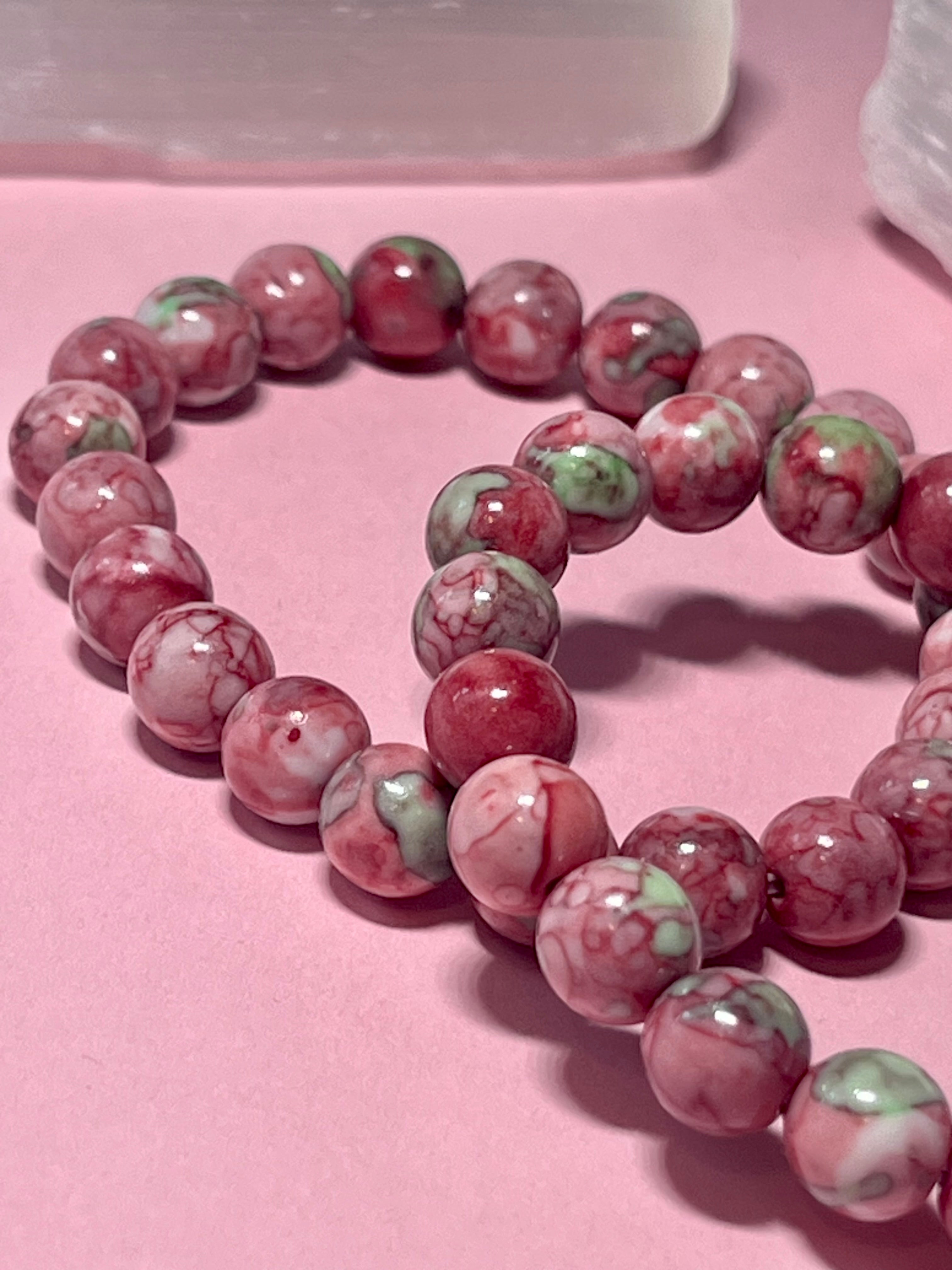 Rain Flower Rhyolite smooth round 8mm bead stretch bracelet (dyed)