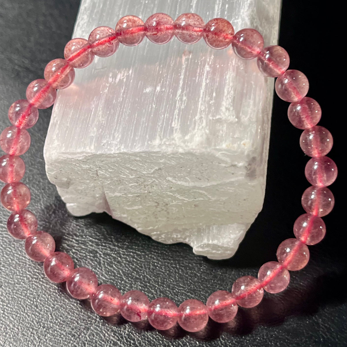 Strawberry Quartz smooth round 6mm bead stretch bracelet (AAA grade)