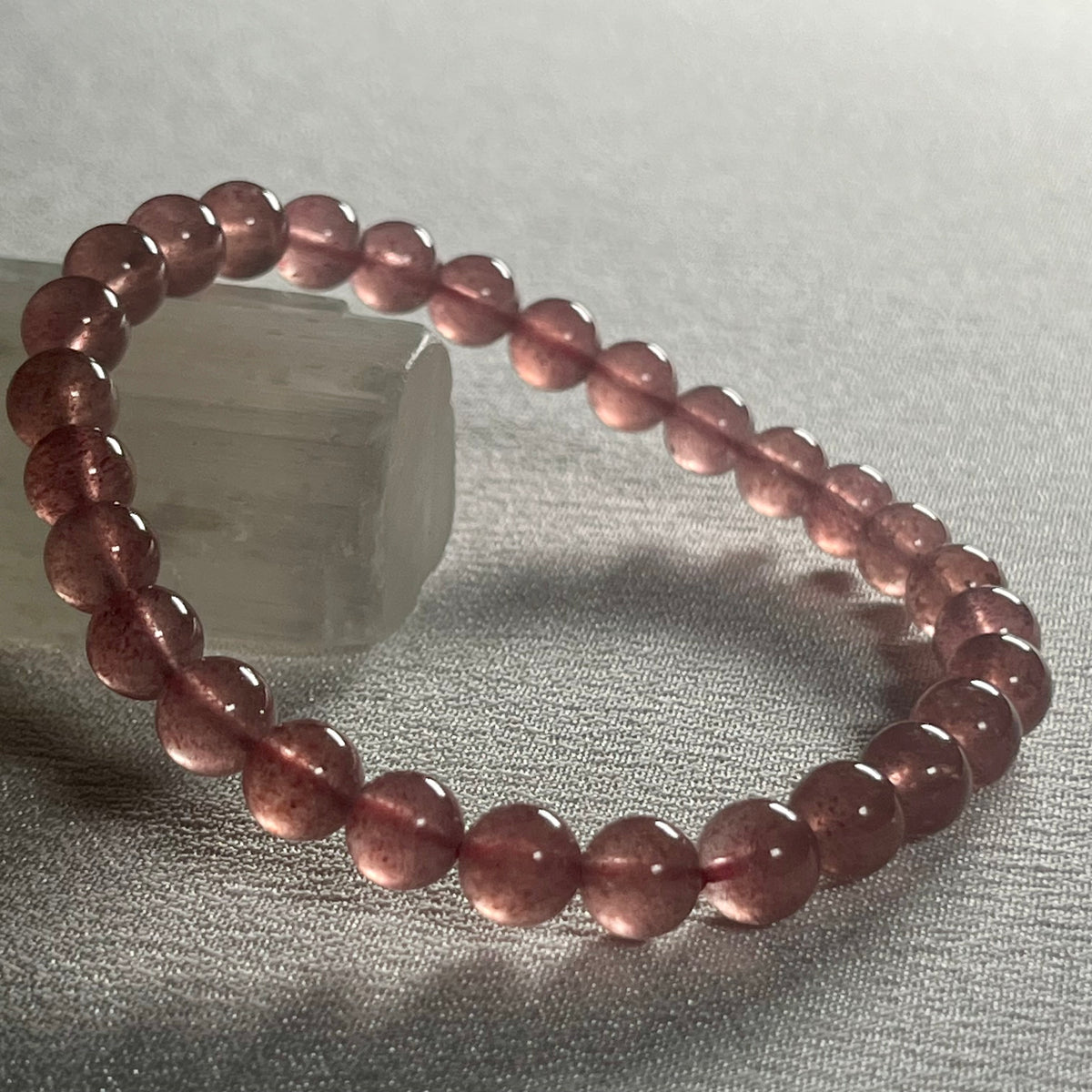 Strawberry Quartz smooth round 6mm bead stretch bracelet (AA grade)