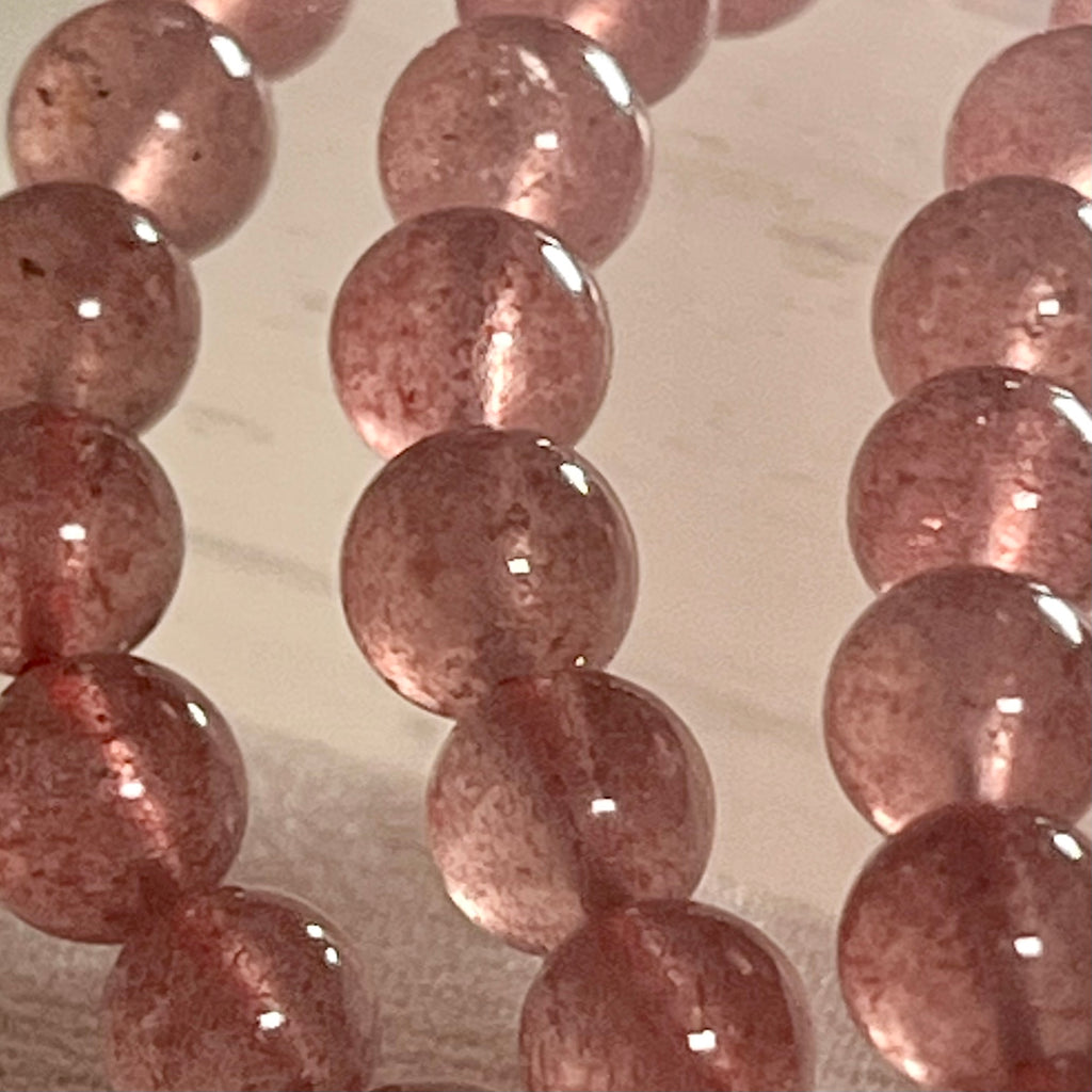 Strawberry Quartz smooth round 6mm bead stretch bracelet (AA grade)