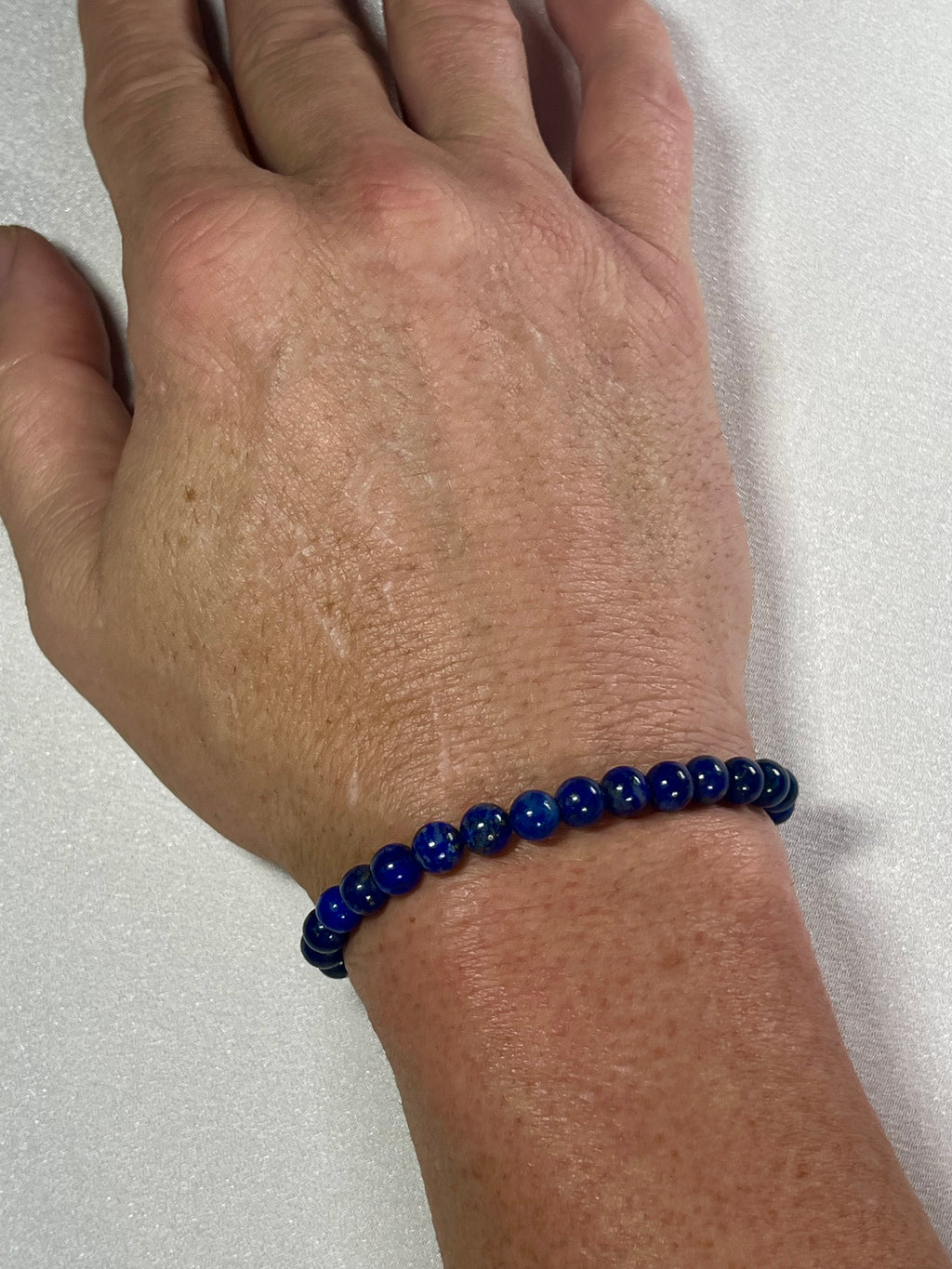 Lapis Lazuli smooth round 6mm bead stretch bracelet (A grade); alternative September birthstone