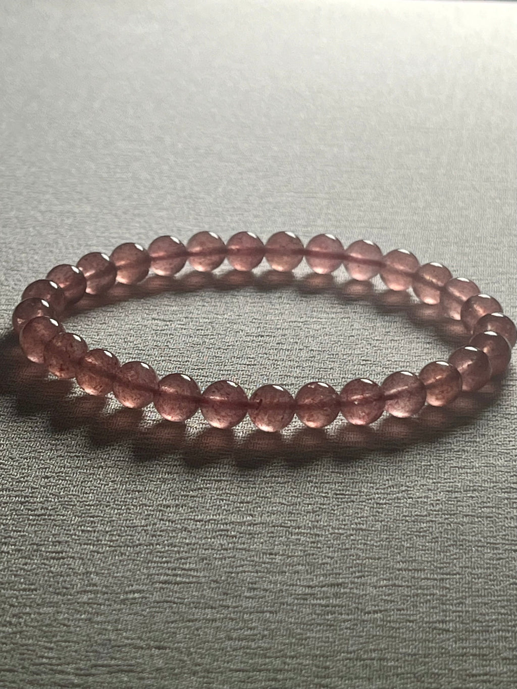 Strawberry Quartz smooth round 6mm bead stretch bracelet (AA grade)