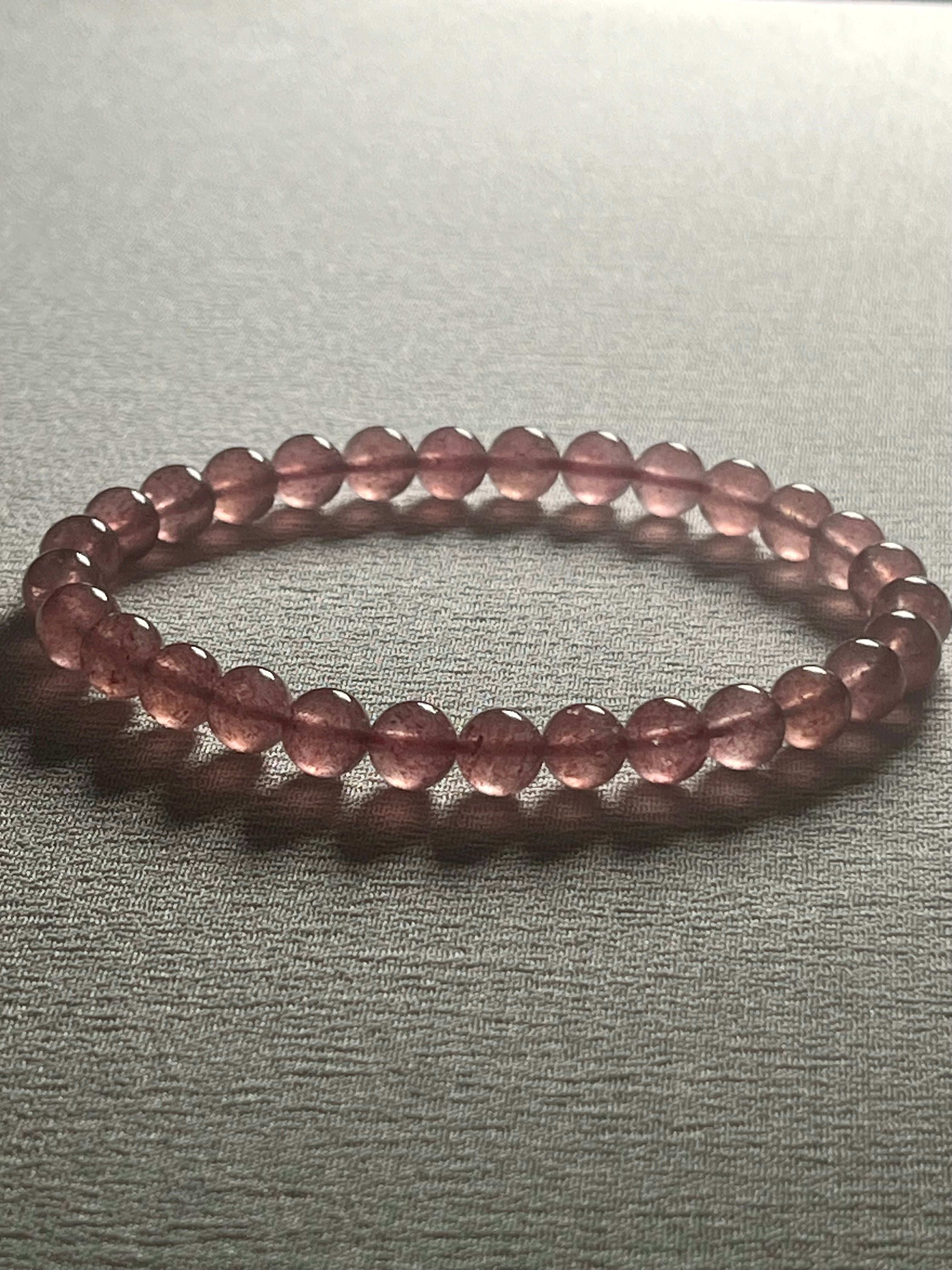 Strawberry Quartz smooth round 6mm bead stretch bracelet (AA grade)