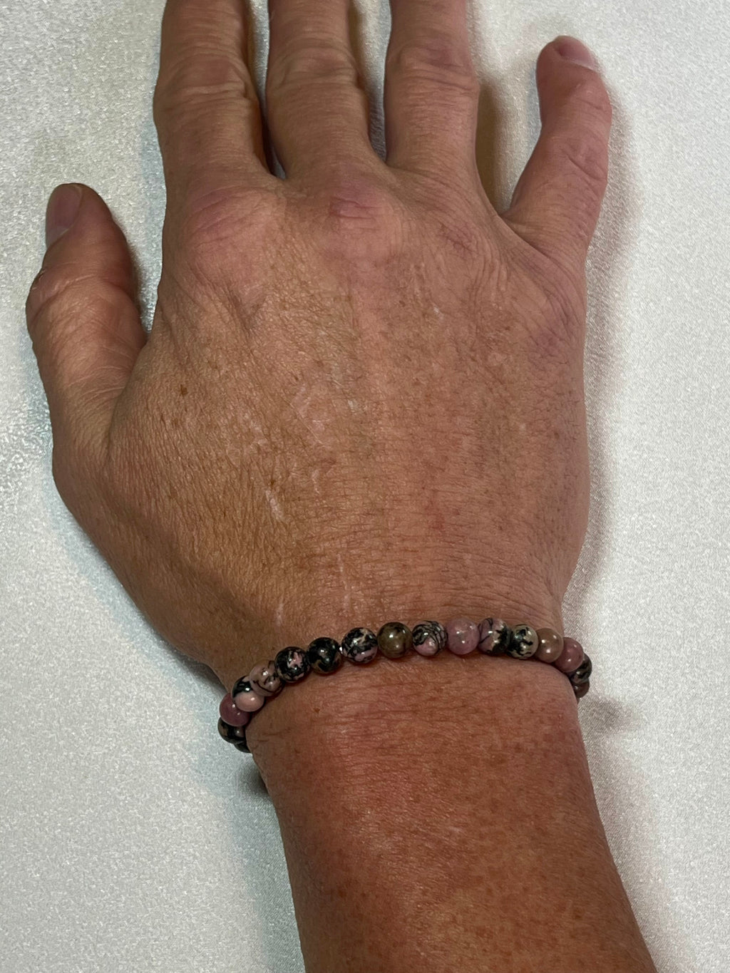 Rhodonite with black matrix smooth round 6mm bead stretch bracelet