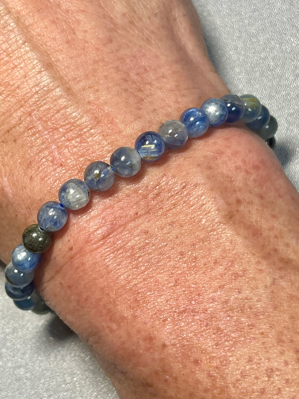 Blue Kyanite Mix smooth round 6mm bead stretch bracelet