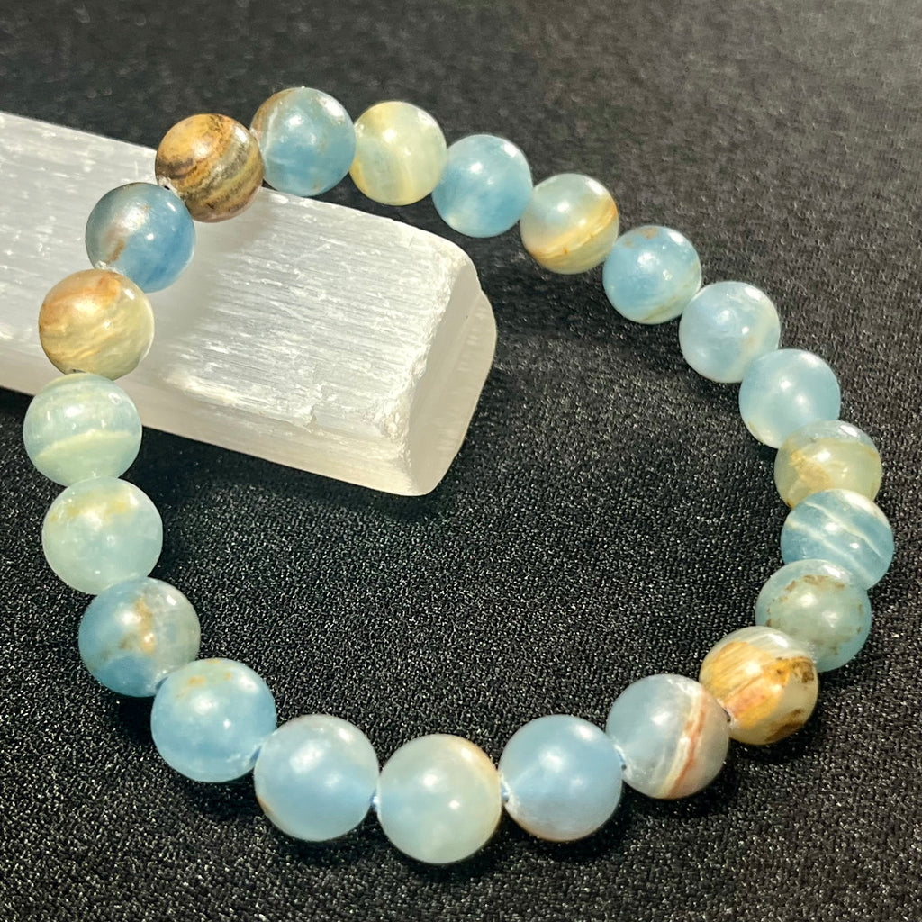 Argentina Blue Calcite smooth round 8mm bead stretch bracelet (AAA grade)