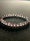 Light Lilac Amethyst smooth round 6mm bead stretch bracelet high clarity (AA grade); February birthstone