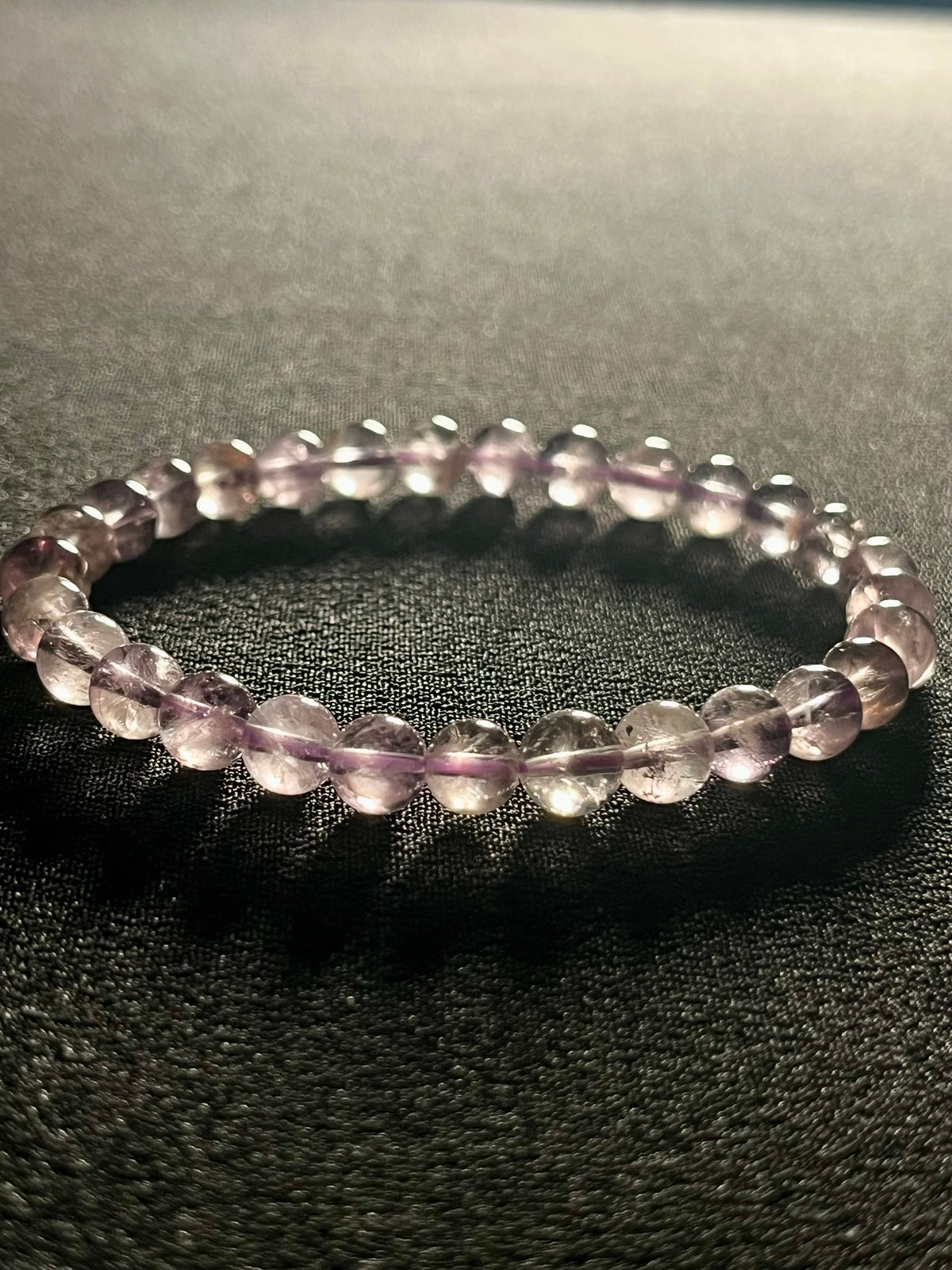 Light Lilac Amethyst smooth round 6mm bead stretch bracelet high clarity (AA grade); February birthstone
