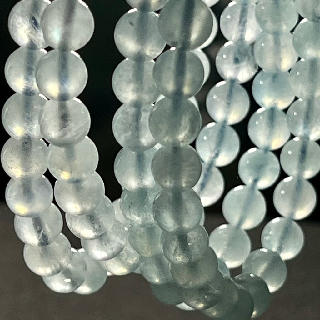 Aquamarine smooth round 6mm bead stretch bracelet; March birthstone
