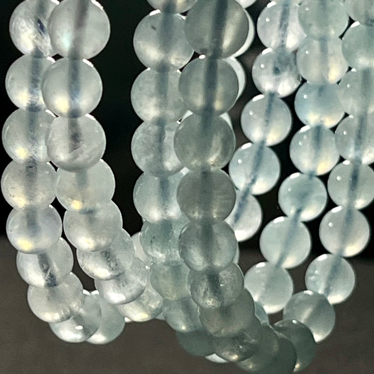 Aquamarine smooth round 6mm bead stretch bracelet; March birthstone